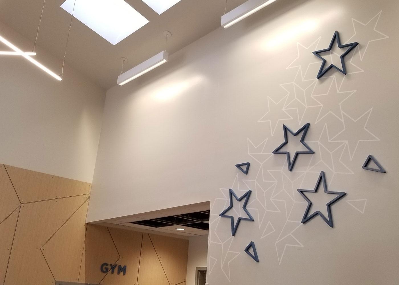 Custom signs and decorative architecture panels were produced as part of the new interior sign package at Centennial ES.