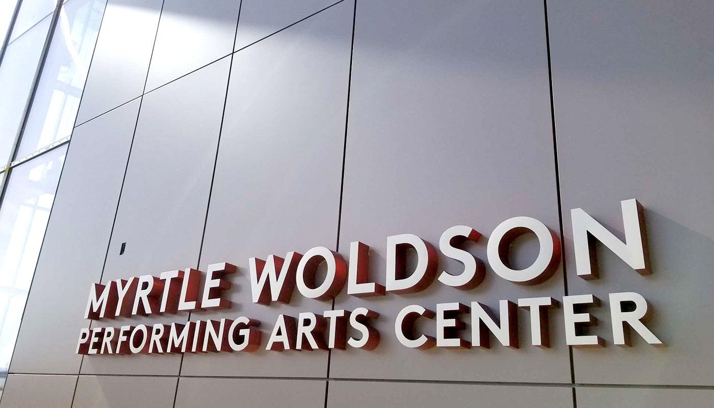 Custom dimensional lettering installed as part of the exterior building identification package at the new Myrtle Woldson Performing Arts Center.