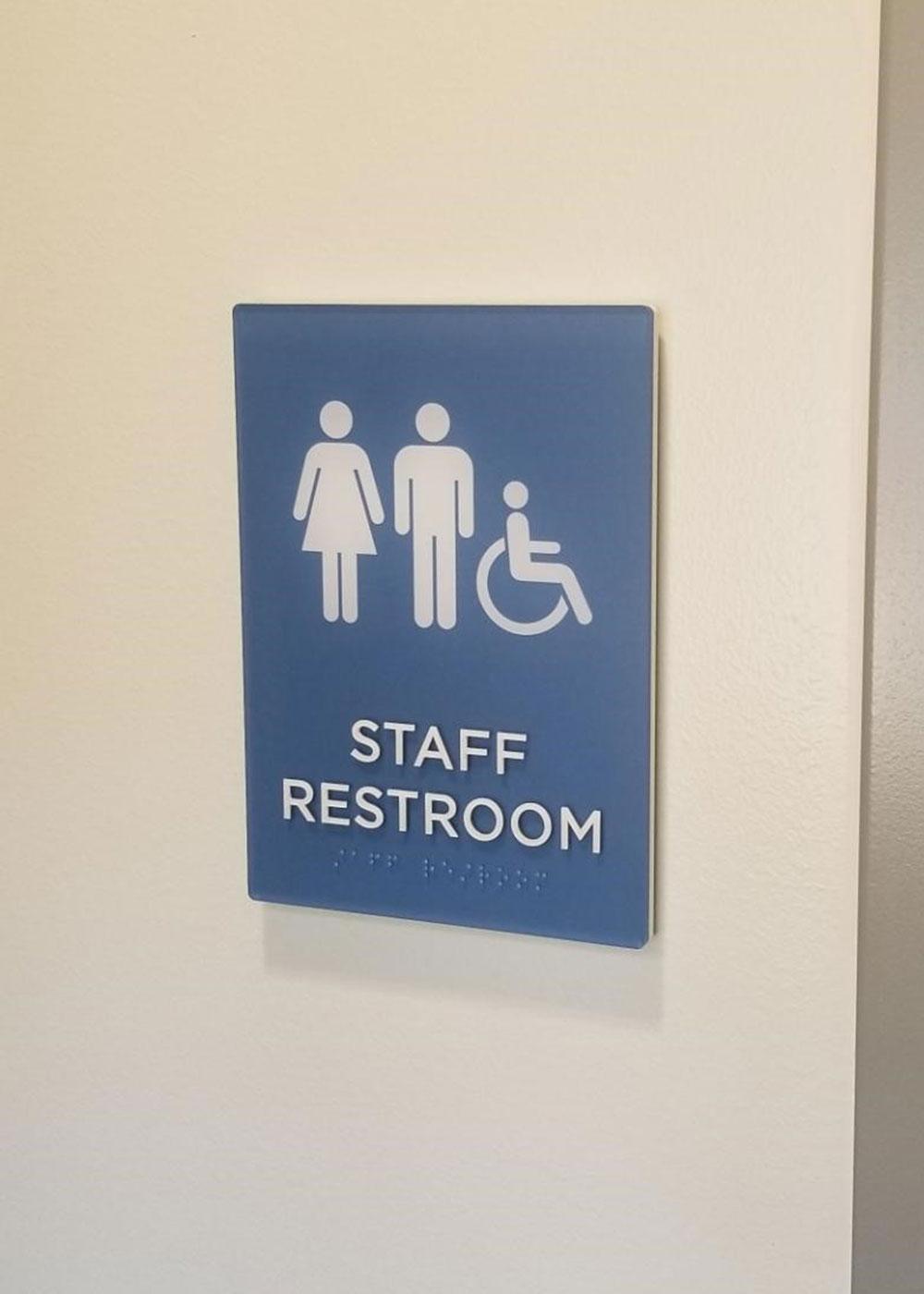 The interior sign package features ADA tactile and braille pieces.